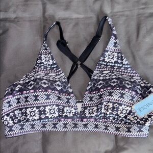 Black and White Patterned swim top with purple accents.